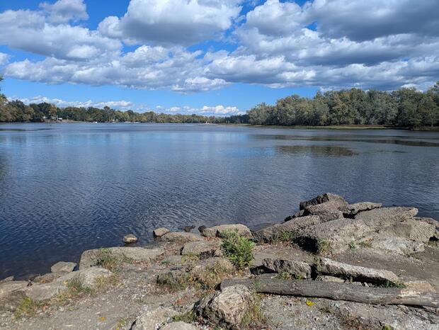 rocky outcrop overlooking water where one could shore fish