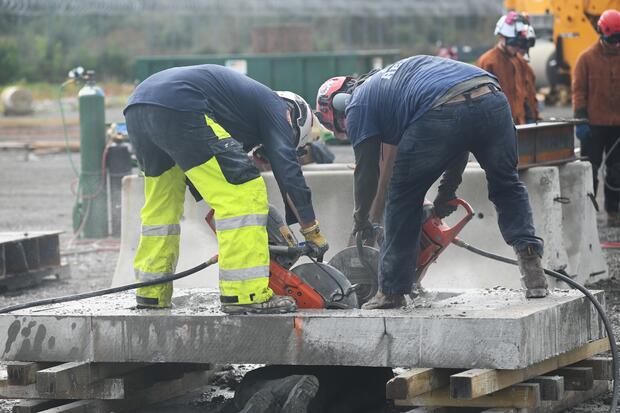 firefighters breaching concrete