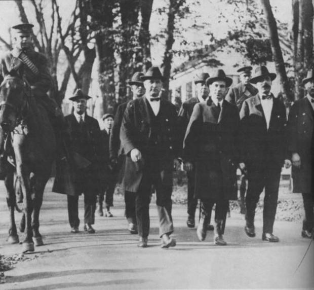Wearing handcuffs, Sacco and Vanzetti were escorted daily from the Dedham jail to the courthouse.