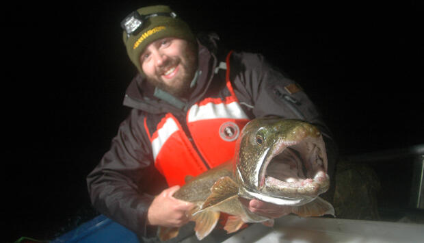MassWildlife staff holding fish