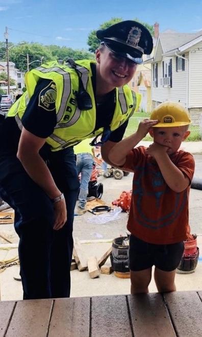 Medford Police Officer with child
