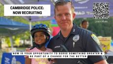 Cambridge police officer with kid