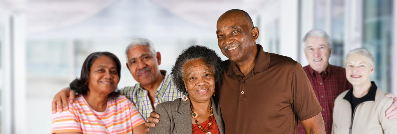 Three smiling elderly couples