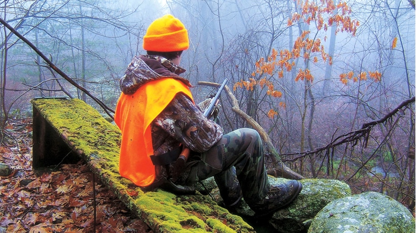 hunter wearing blaze orange