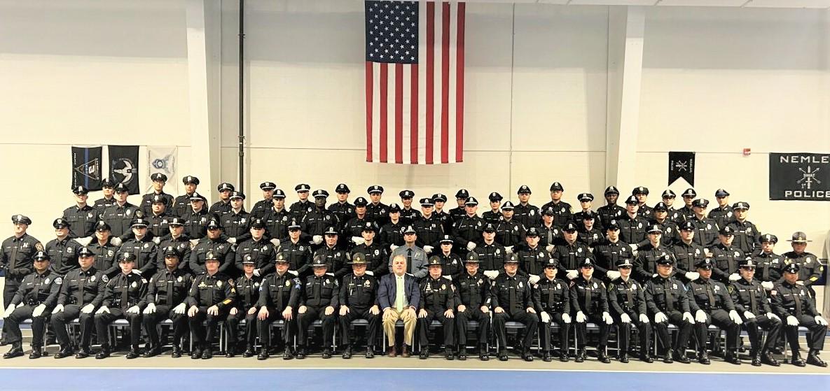 Local Police Officers Pose for Graduation picture
